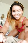 Tiny Asian amateur Riley pulling down her man\'s pants to suck his large dick
