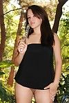 Sexy oriental brunette Callie Dee in black mini dress dildos her exotic snatch