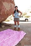 Slant-eyes babe London Keyes shows her shaved coochie outdoors over stone