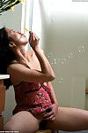 Amateur Asian woman Peggy blows soapy bubbles on her pussy