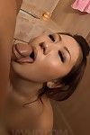 Cute Asian Ai Yuumi puts on sleazy stockings and gives her man some oral sex