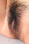 Oriental amateur Raunchy flaunting smallish mounds while stretching hairy cunt