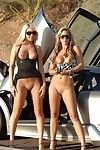 Lez girls Alison Angel and Lia 19 show their milk cans and wet cracks outdoors beside expensive car