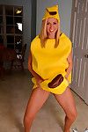 Daring and smoking clammy golden-haired youthful in yellow clothing is posing her vast ass on the floor