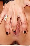 Ebon haired babe Kirsten Price demonstrates her shiny on top slit and fingers her rigid hole