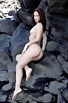 Gorgeous chick Susana Spears has climbed the rocks to spread exposed body as wide as possible