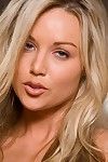 Blonde beauty Kayden Kross pulls off her lace underware and gives a close-up pics of her slit