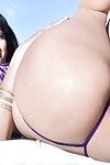 Latina babe Sophia Leone stripping out of bikini outdoors in pornstar debut