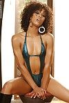 Curly ebony babe Misty Stone takes off her bikini and boots before she takes white cock doggy style