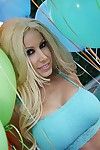 Blonde pornstar Gina Lynn with huge tits and shaved pussy poses naked with balloons