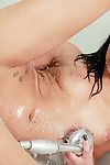 Brunette beauty goes naughty in the shower by masturbating her wet vag