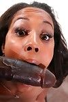 Slim dark skinned slut Misty Stone in stockings and boots gets attacked by monster cock