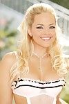 Blonde bombshell Alexis Texas wears sexy white stockings and gives a hot outdoor striptease