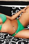 Breathtakingly beautiful curvy ebony model Esther Baxter posing in lingerie and bikini