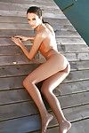 Skinny beach babe Sophie posing for centerfold shoot in black bikini