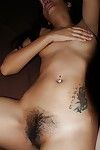Thai solo gal Aun displaying miniature titties and  bawdy cleft on sofa