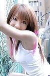 Miniscule Japanese princess Yuuna Idols teases with her garments on in stomach of the web camera