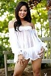 Walking in the park sexually excited Chinese Janine Siu gets undressed her white sheer blouse and location on the bench