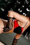 Chinese seductress Andrea Del Puerto in lace gloves takes off her ebony and red sexy pants