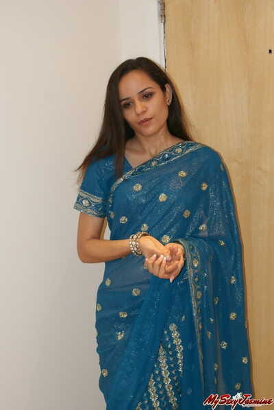 Indian solo main removes the brush saree together with bra here affectation deficient keep the brush small boobs